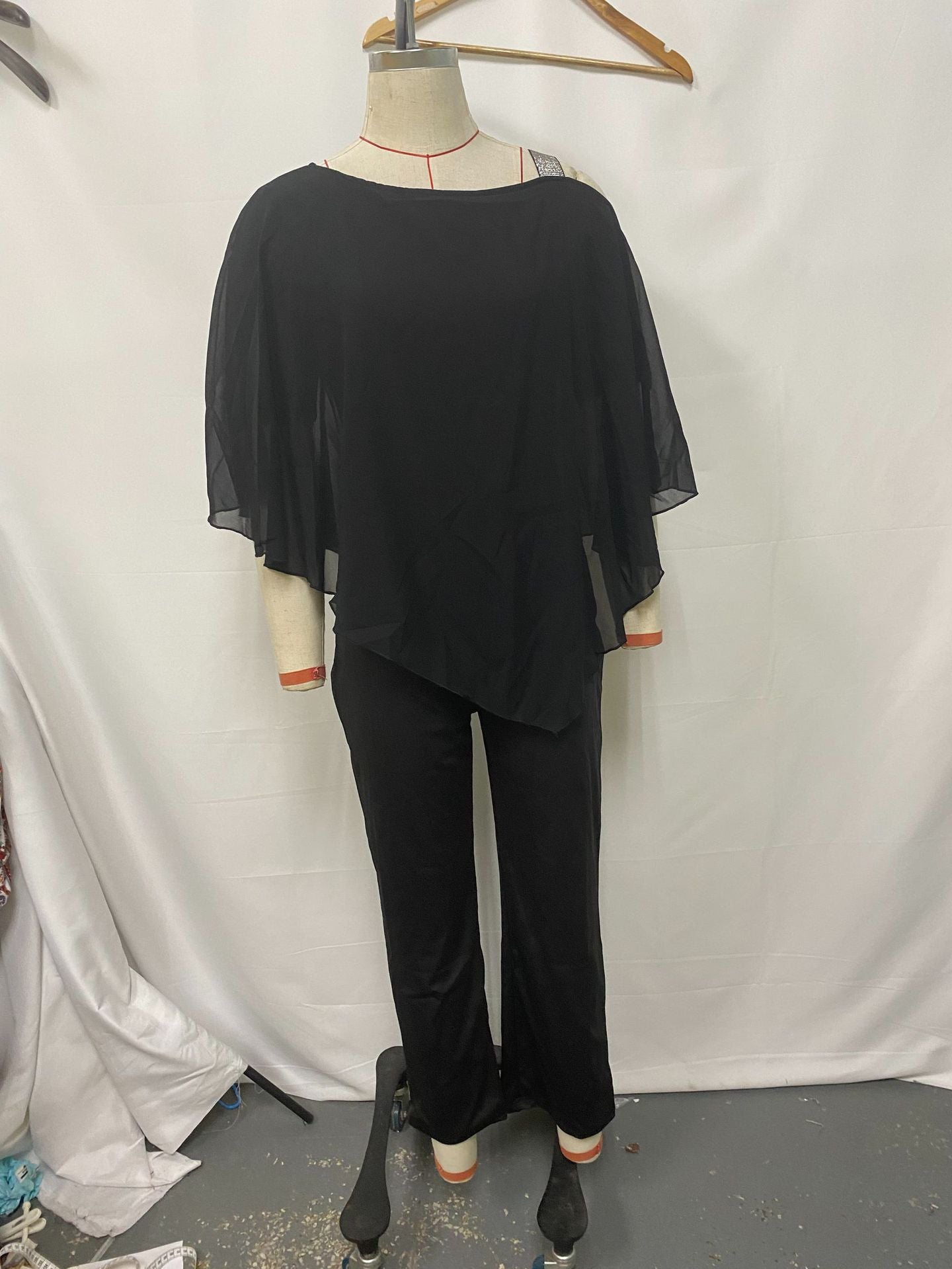 Solid color irregular off-the-shoulder one-piece flared pants for women's autumn and winter